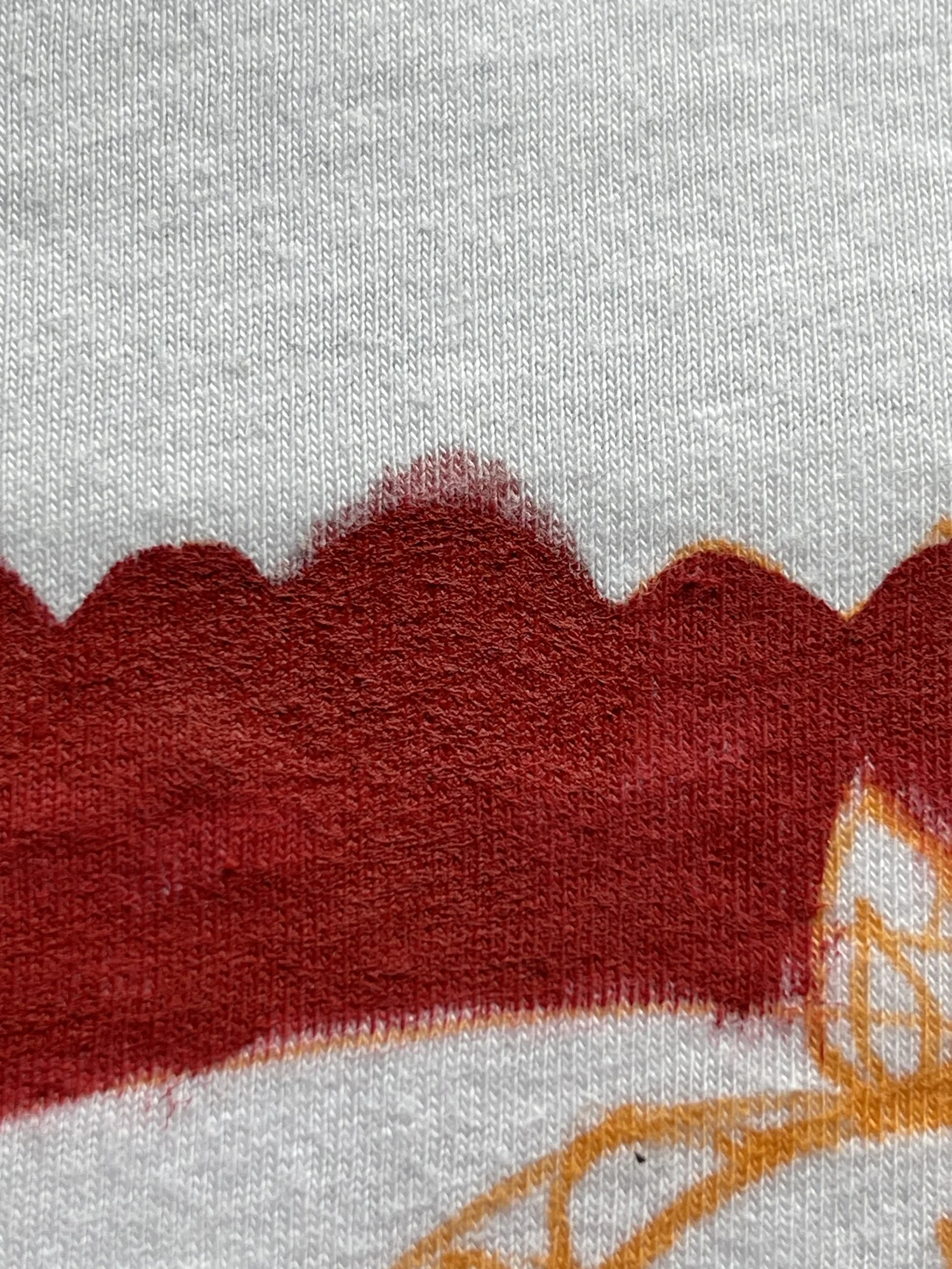 Fabric paint consistency on a palette — not too liquid, not too thick